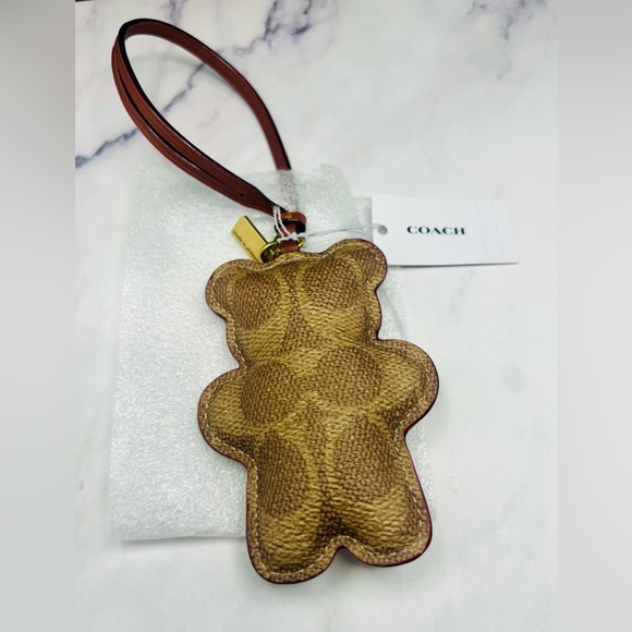 Coach Accessories - Coach Bear Puffy Bag Charm In Signature Tan/Caramel Canvas NWT